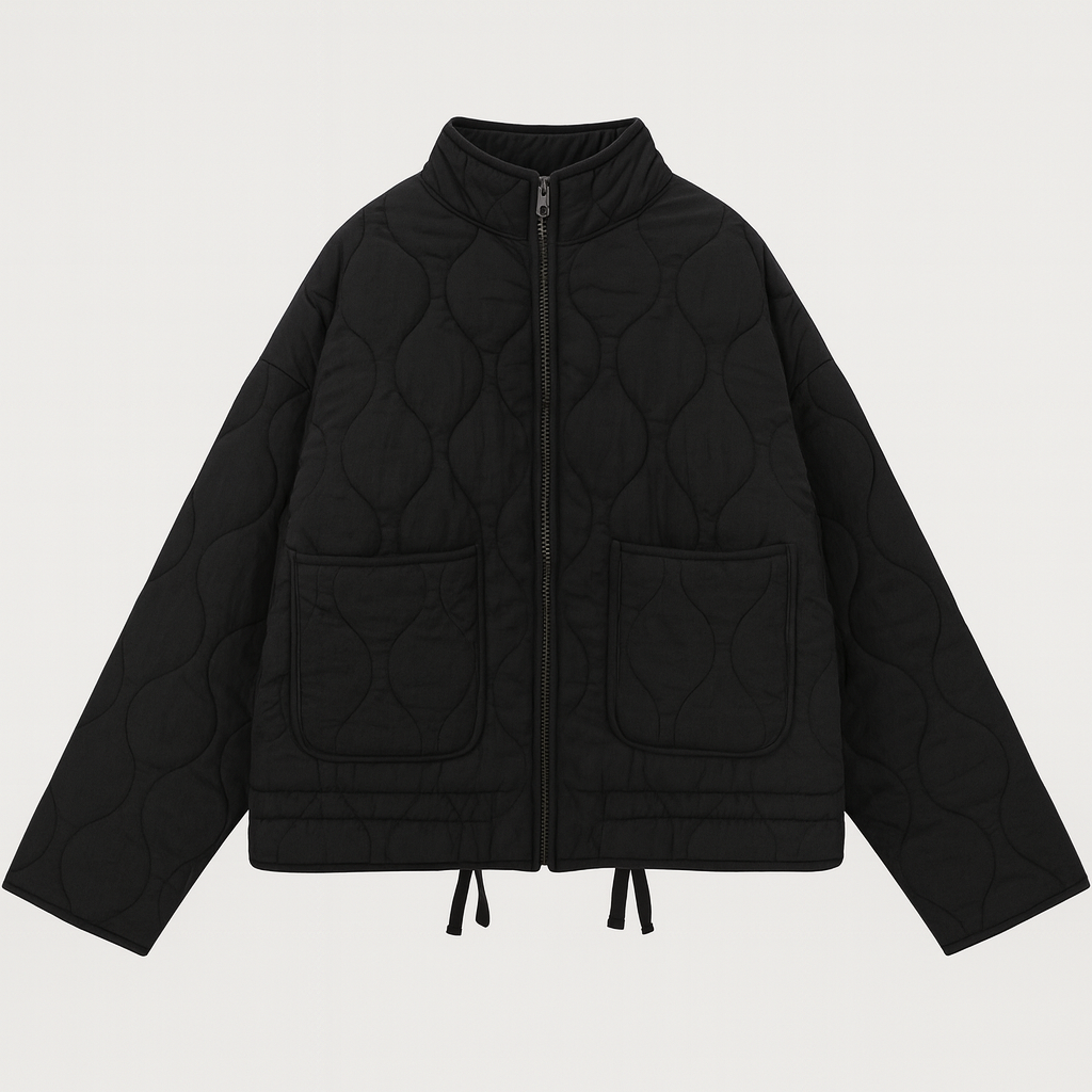 A quilted jacket featuring a high collar, full front zipper, and relaxed fit. Designed with wave-pattern stitching, two large front patch pockets, and adjustable drawstrings at the hem for a customizable fit. A minimalist yet functional outerwear piece perfect for layering in cooler weather.
