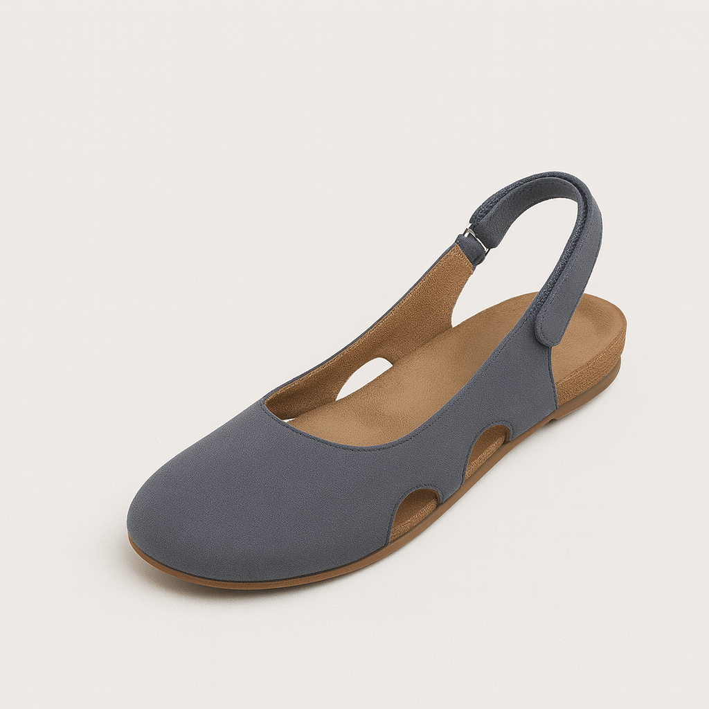 Slingback flats with rounded toe, cushioned insole, and side cutout details, styled for versatile everyday wear