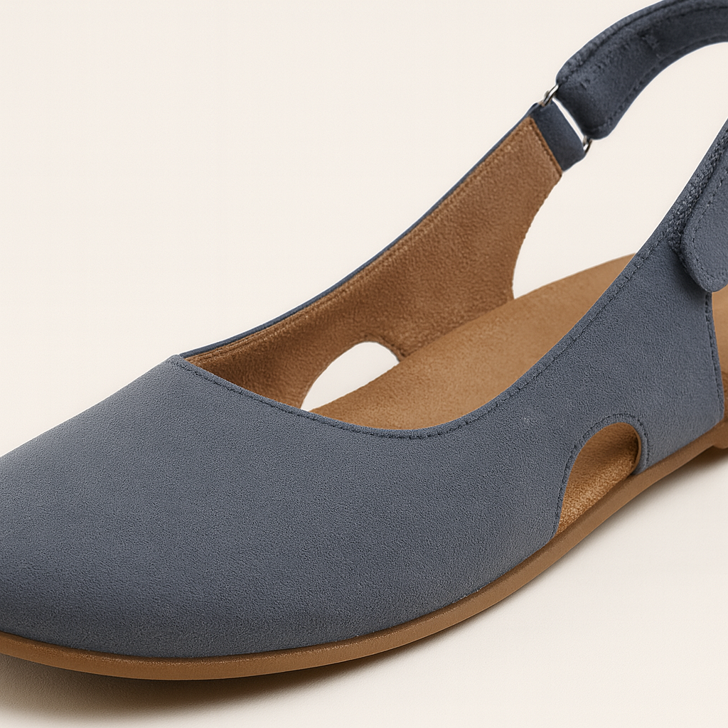 Slingback flats with rounded toe, cushioned insole, and side cutout details, styled for versatile everyday wear