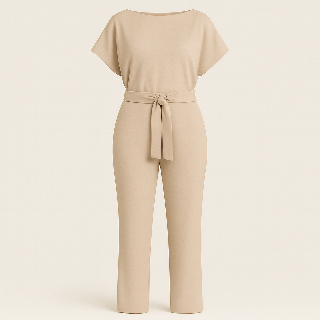Jumpsuit with boat neckline, tie waist detail, short sleeves, and wide-leg cut, styled for polished all-day wear