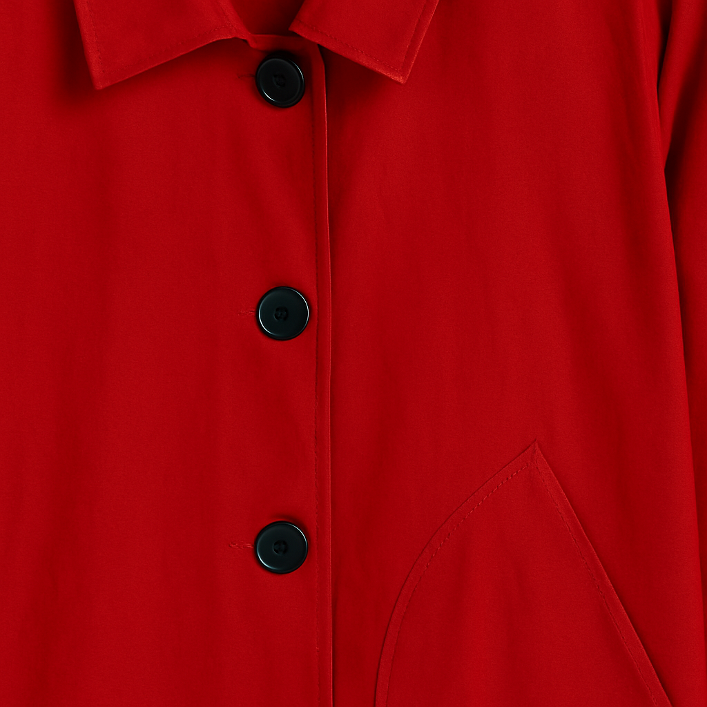 Hooded coat with button-front closure, elastic cuff sleeves, and side pockets, styled with a scarf and casual layering