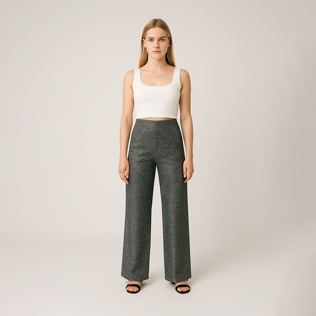 Wide-leg glitter pants with high-rise waist and shimmering finish, styled for glamorous statement looks