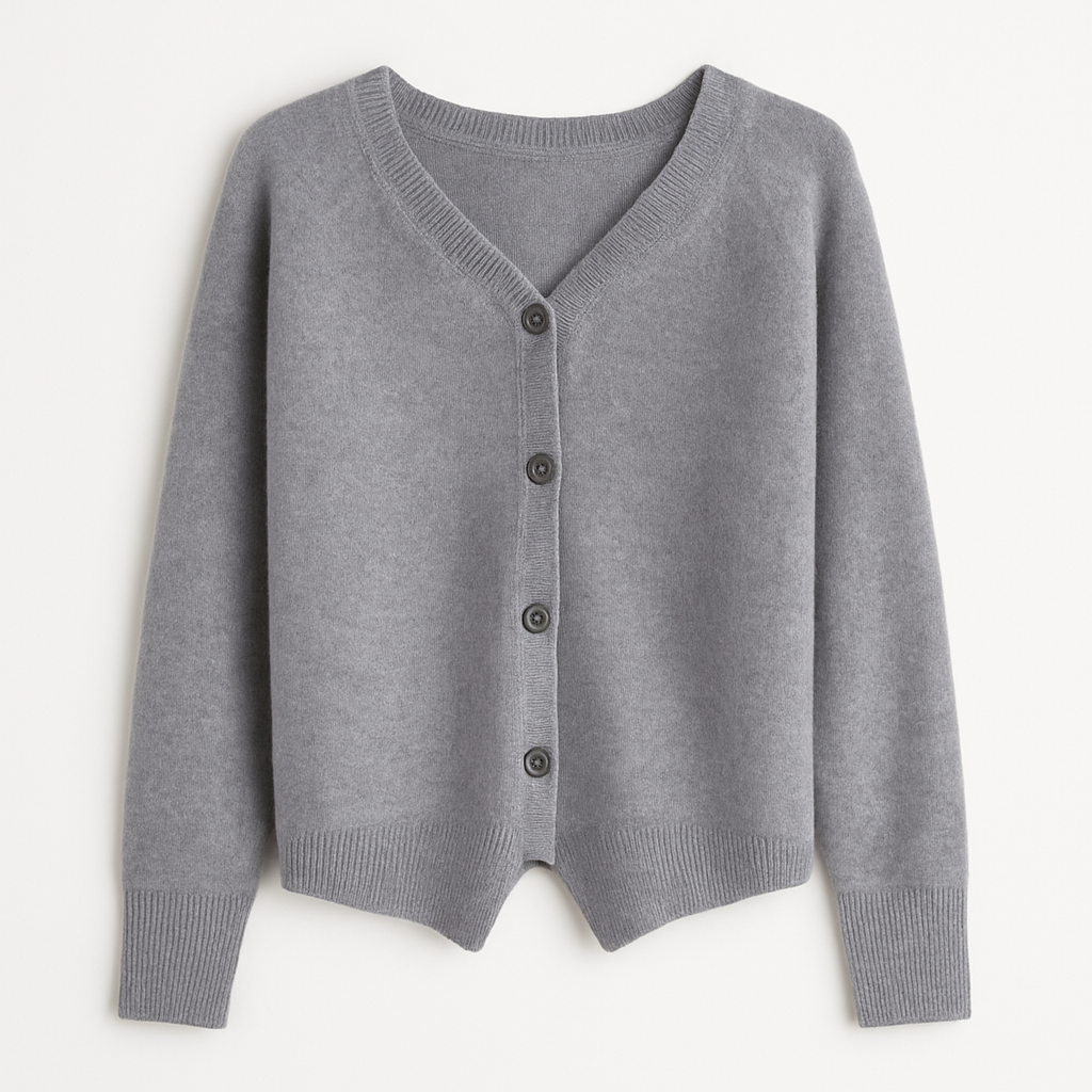 A plain knitted cardigan with a V-neckline, long sleeves, and front button closure.