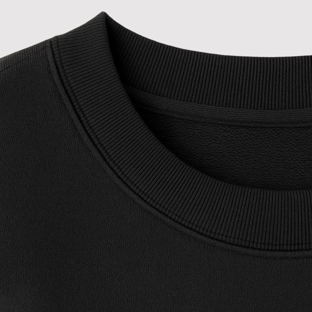 A plain pullover sweatshirt with a crew neckline, long sleeves, and ribbed cuffs and hem.