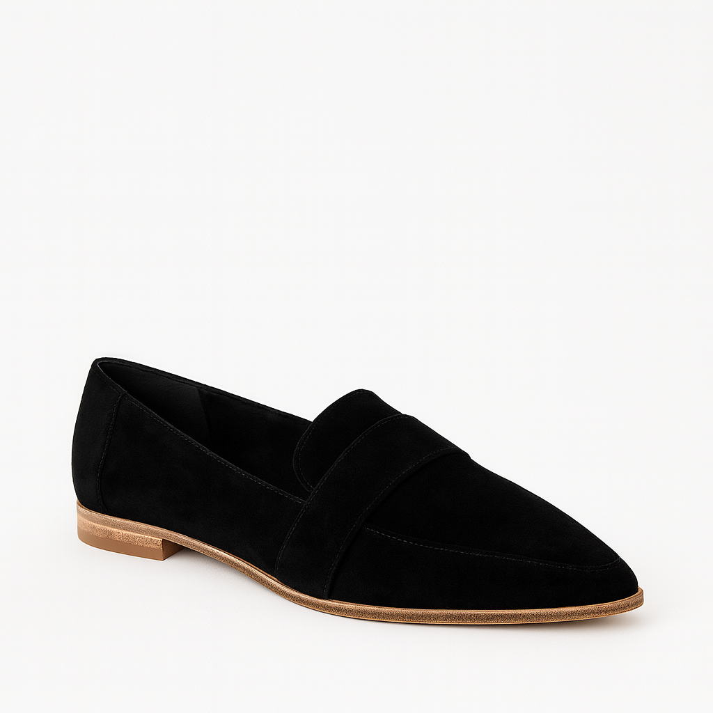 Suede loafer with a pointed toe, low heel, and strap detail across the upper.