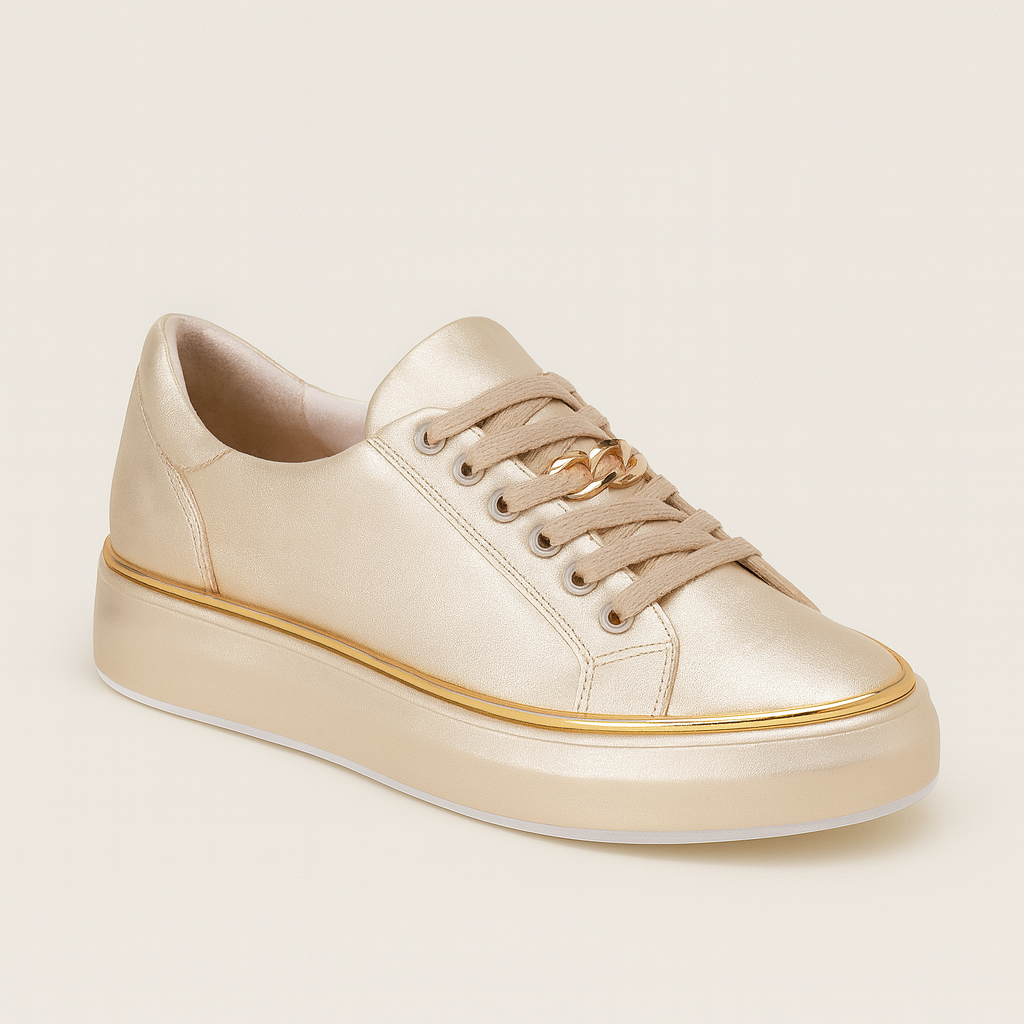 Platform sneakers with gold trim accents and lace-up design