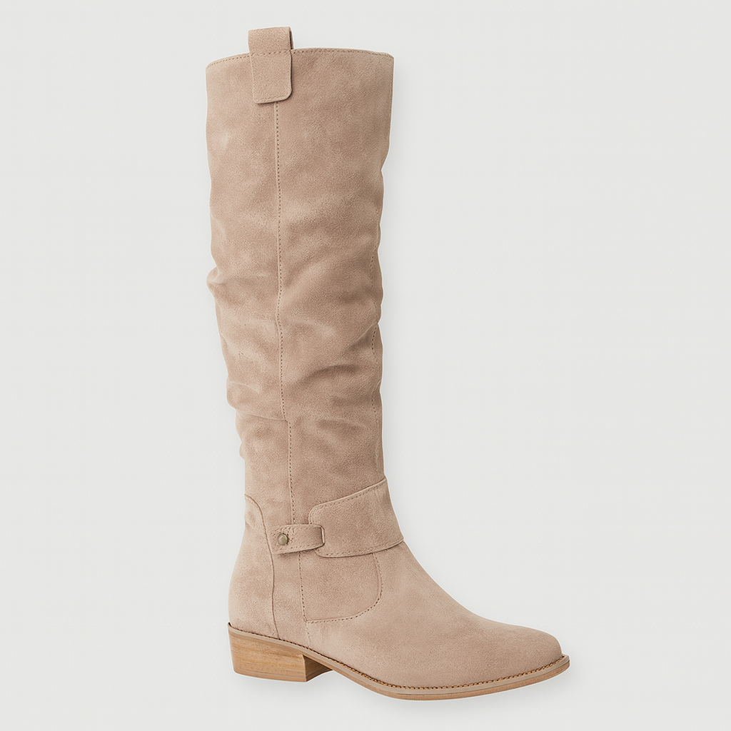 Knee-high suede boots with low block heels, side zips, and decorative straps.