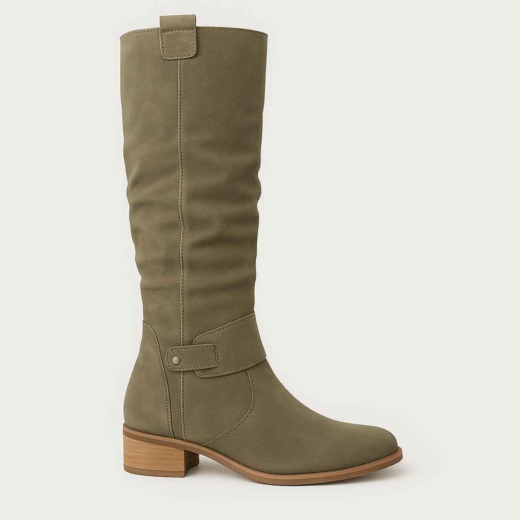 Knee-high suede boots with low block heels, side zips, and decorative straps.