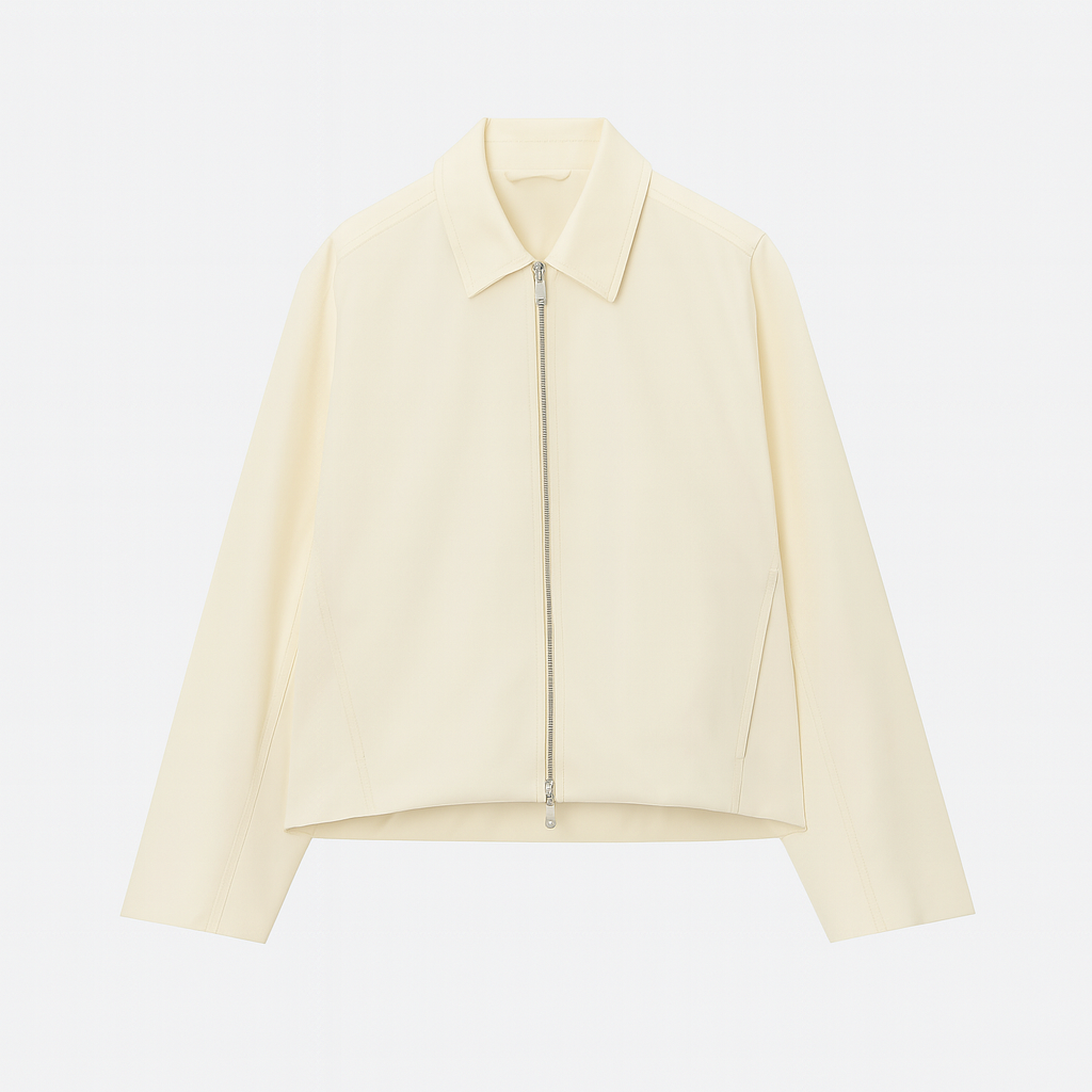 A minimalist jacket with a silver zipper front, classic shirt collar, and long sleeves.