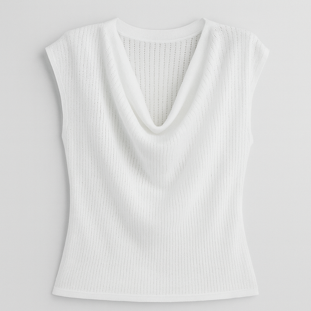 White sleeveless drape neck knit top styled with light wash denim shorts and accessories for a chic summer look