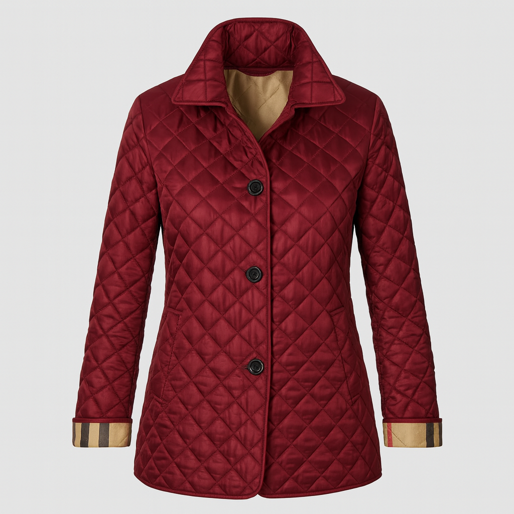 Quilted jacket with front button closure, stand collar, and welt pockets.
