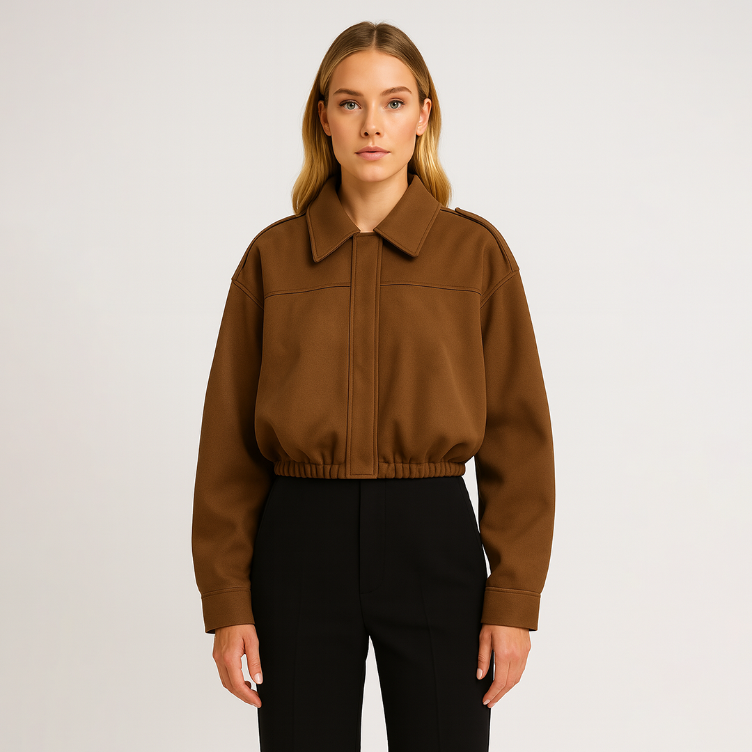 Faux suede bomber jacket with shirt collar and relaxed fit, designed for casual and contemporary layering