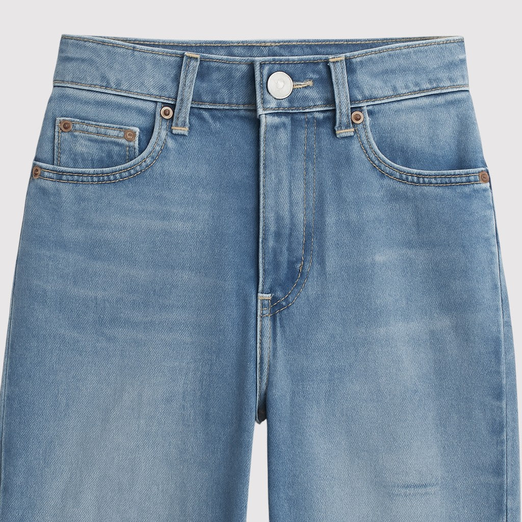 Vintage-inspired wide-leg denim jeans with mid-rise waist and light wash.