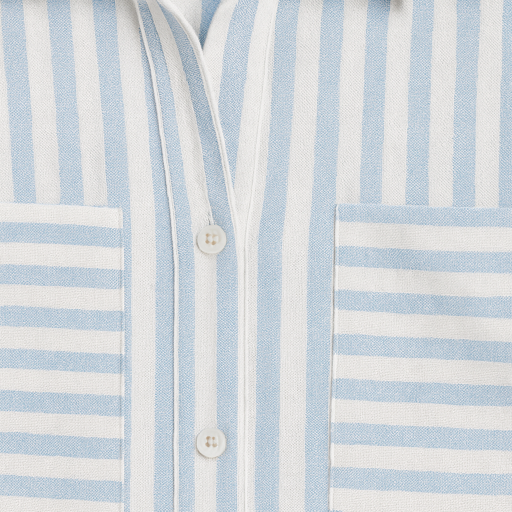 Button-up shirt with vertical stripes, featuring a pointed collar, long sleeves, and two chest pockets with horizontal stripes.