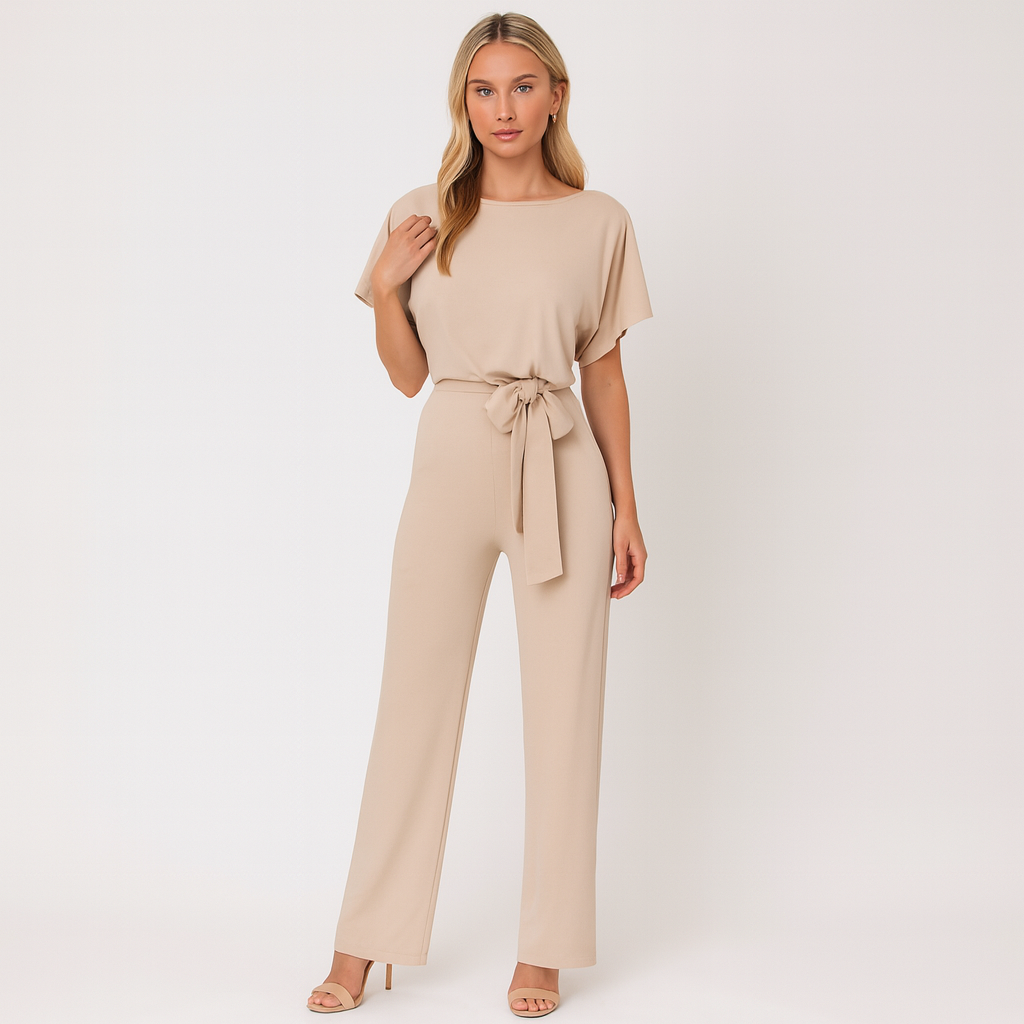 A wide-leg jumpsuit featuring a round neckline, short sleeves, and a waist tie belt.