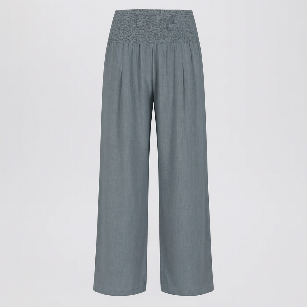 Wide-leg pants with smocked waistband and pleated detailing.