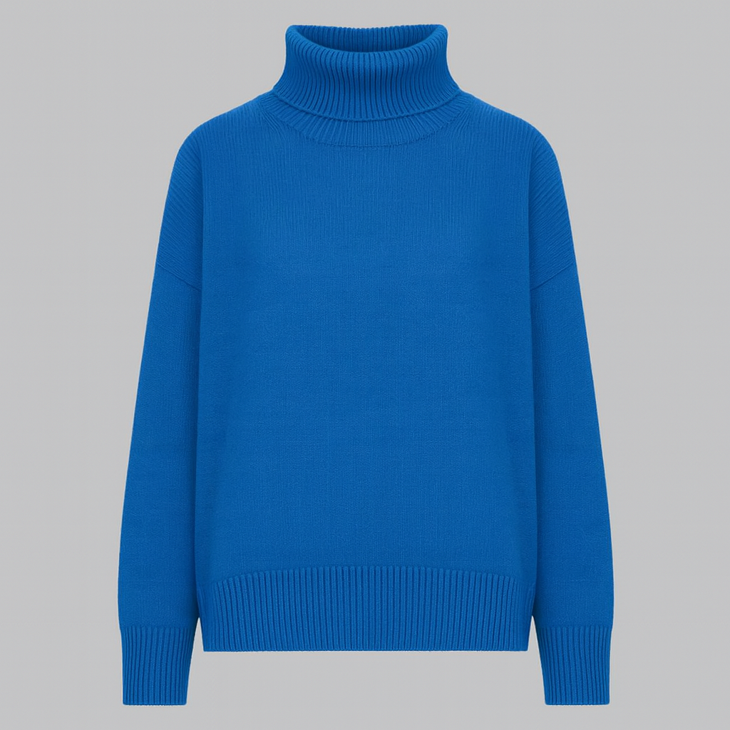 Oversized turtleneck sweater with dropped shoulders, long sleeves, and ribbed cuffs and hem, styled for casual cozy wear