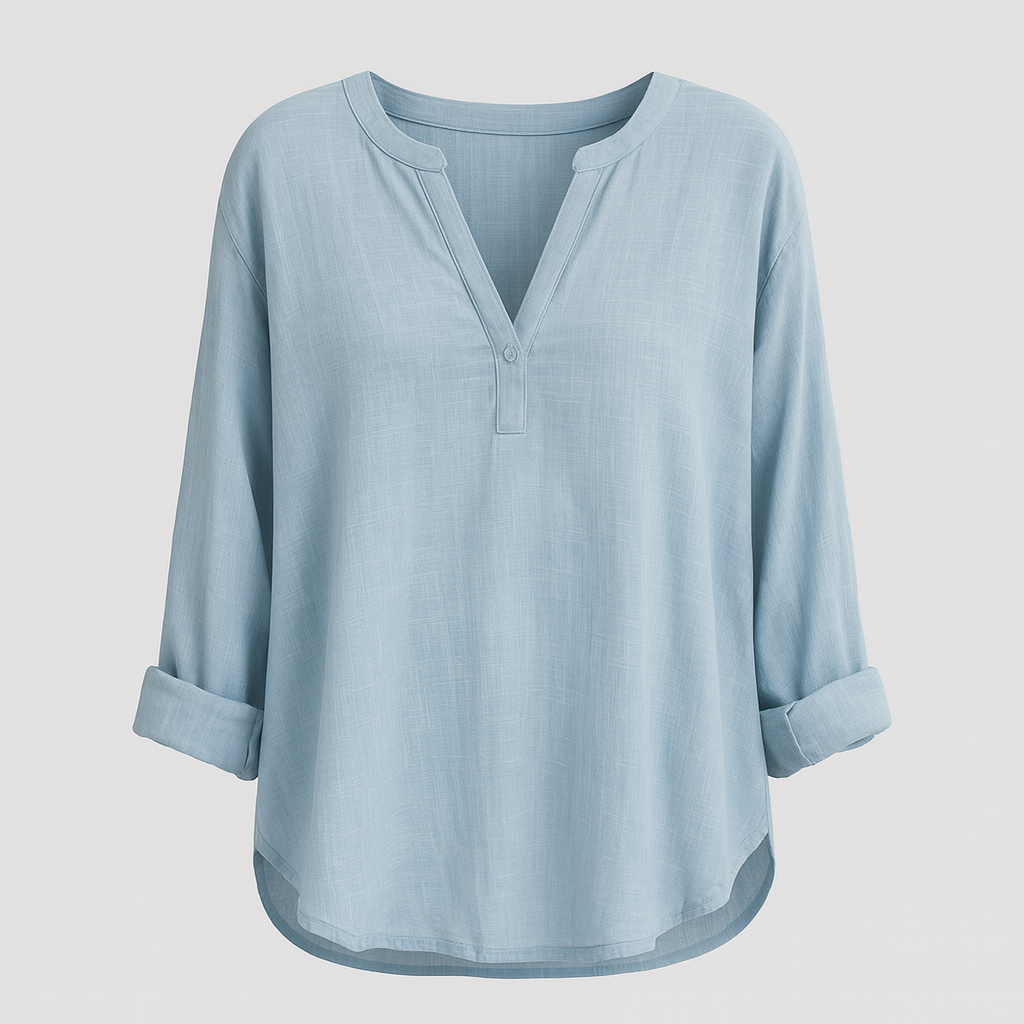 Light blue tunic blouse with notched V-neckline, flowy silhouette, and rolled sleeves.