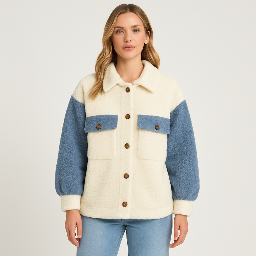 Button-up sherpa jacket with a pointed collar, two flap chest pockets, and long sleeves.