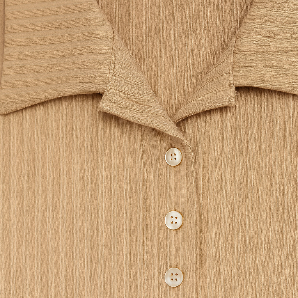 Ribbed short-sleeve polo shirt with button placket and classic collar.