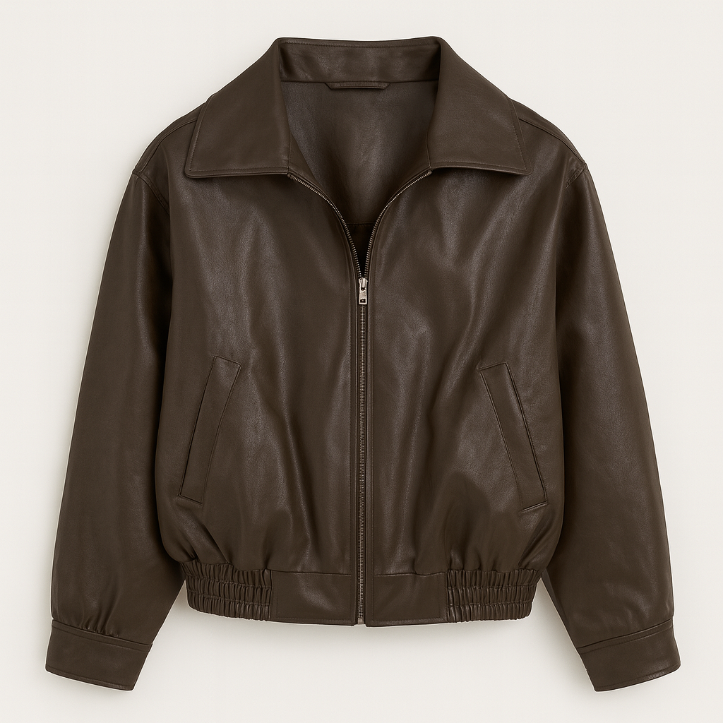 Front-zip leather jacket with a wide collar, side slit pockets, elastic hem, and cuffed sleeves.