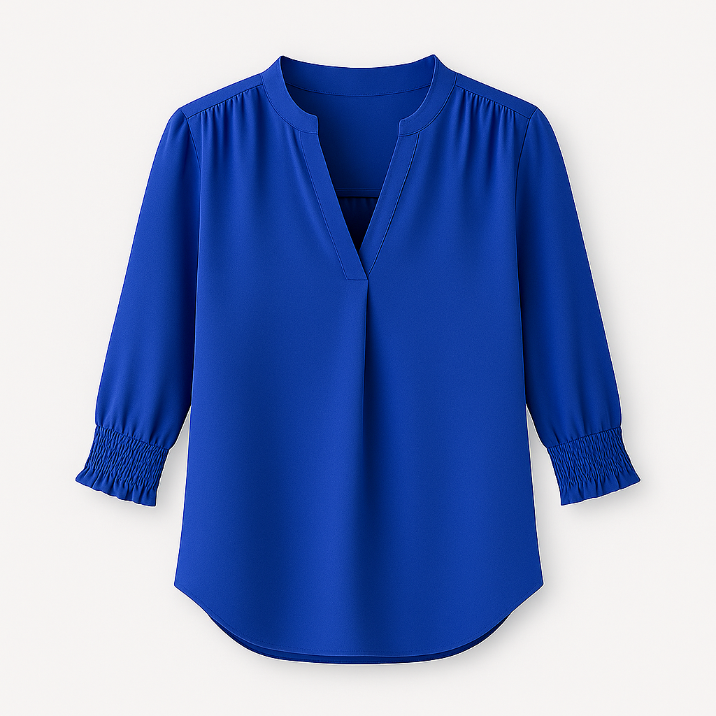 Blouse with V-neckline and smocked short sleeves.