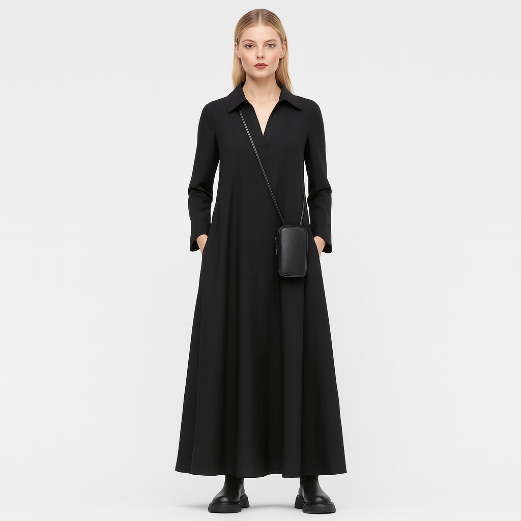 A long-sleeve, ankle-length dress with a flared silhouette, collared neckline, and V-shaped opening at the chest.