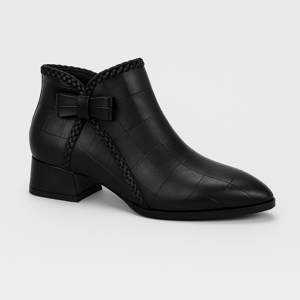 Ankle-high boots with side bow accent, low block heel, and zipper closure designed for versatile casual and dress wear